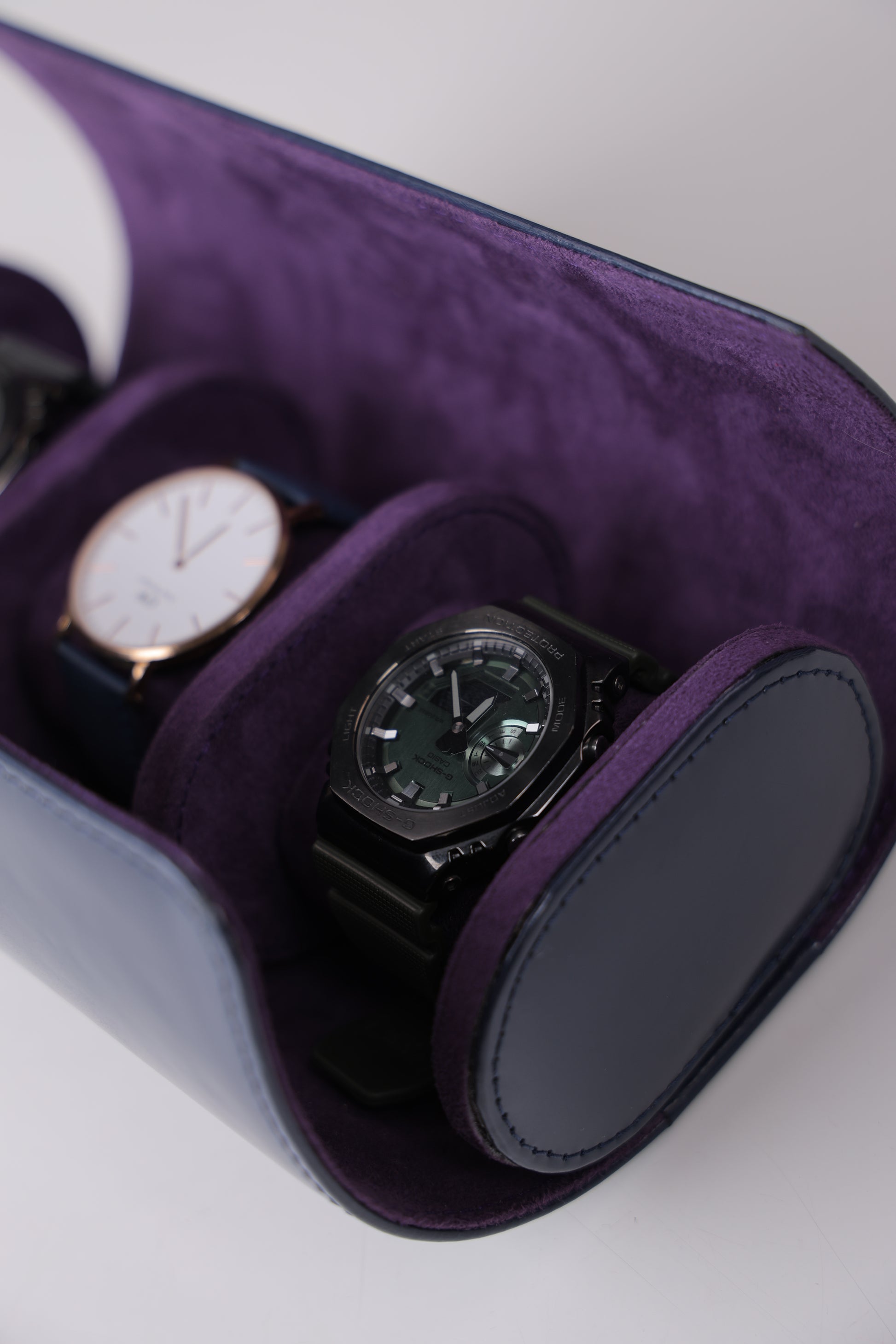 NAVY PATENT EXTERIOR AND PURPLE INTERIOR WATCH ROLL- 3 SLOT