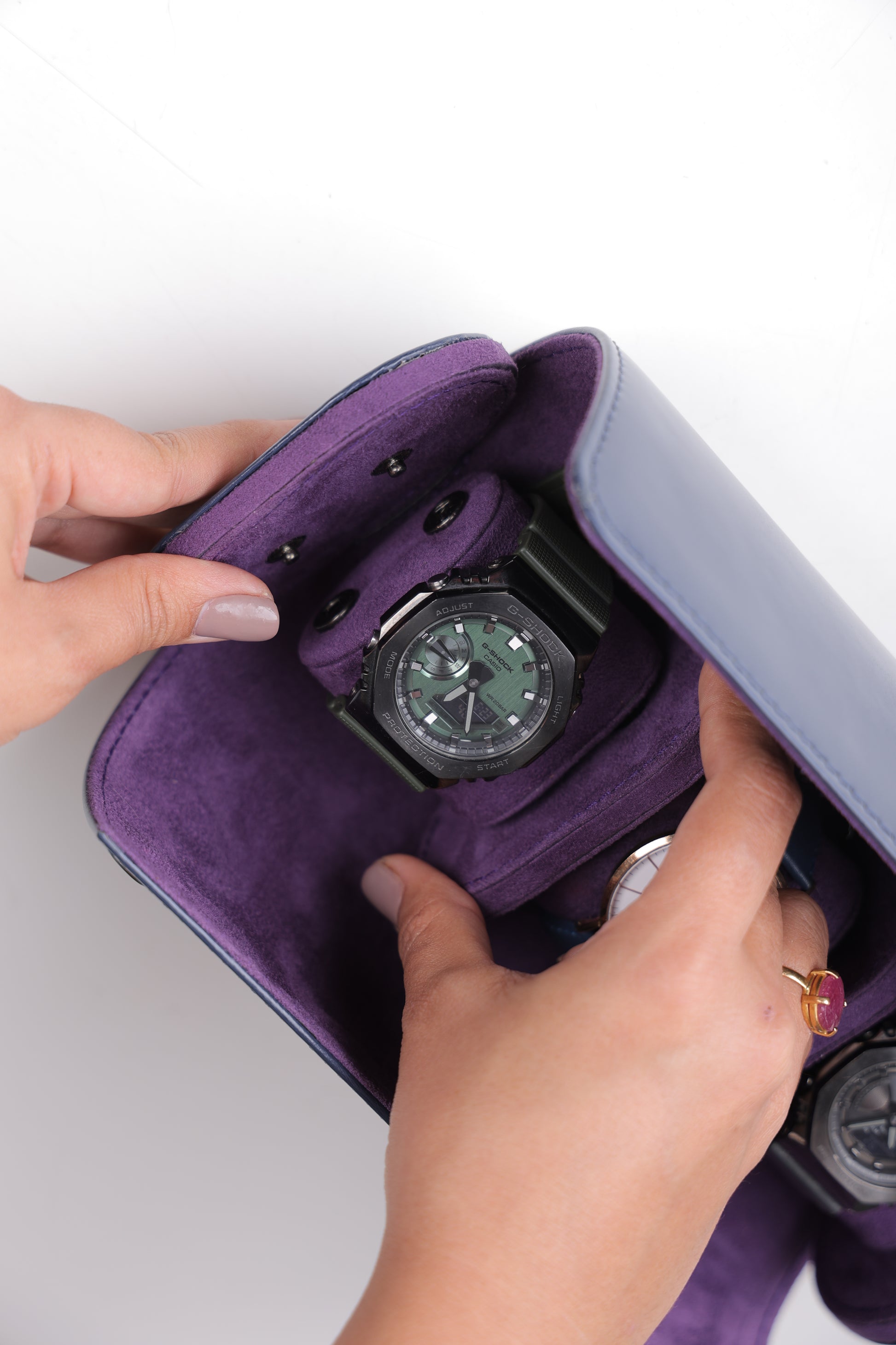 NAVY PATENT EXTERIOR AND PURPLE INTERIOR WATCH ROLL- 3 SLOT