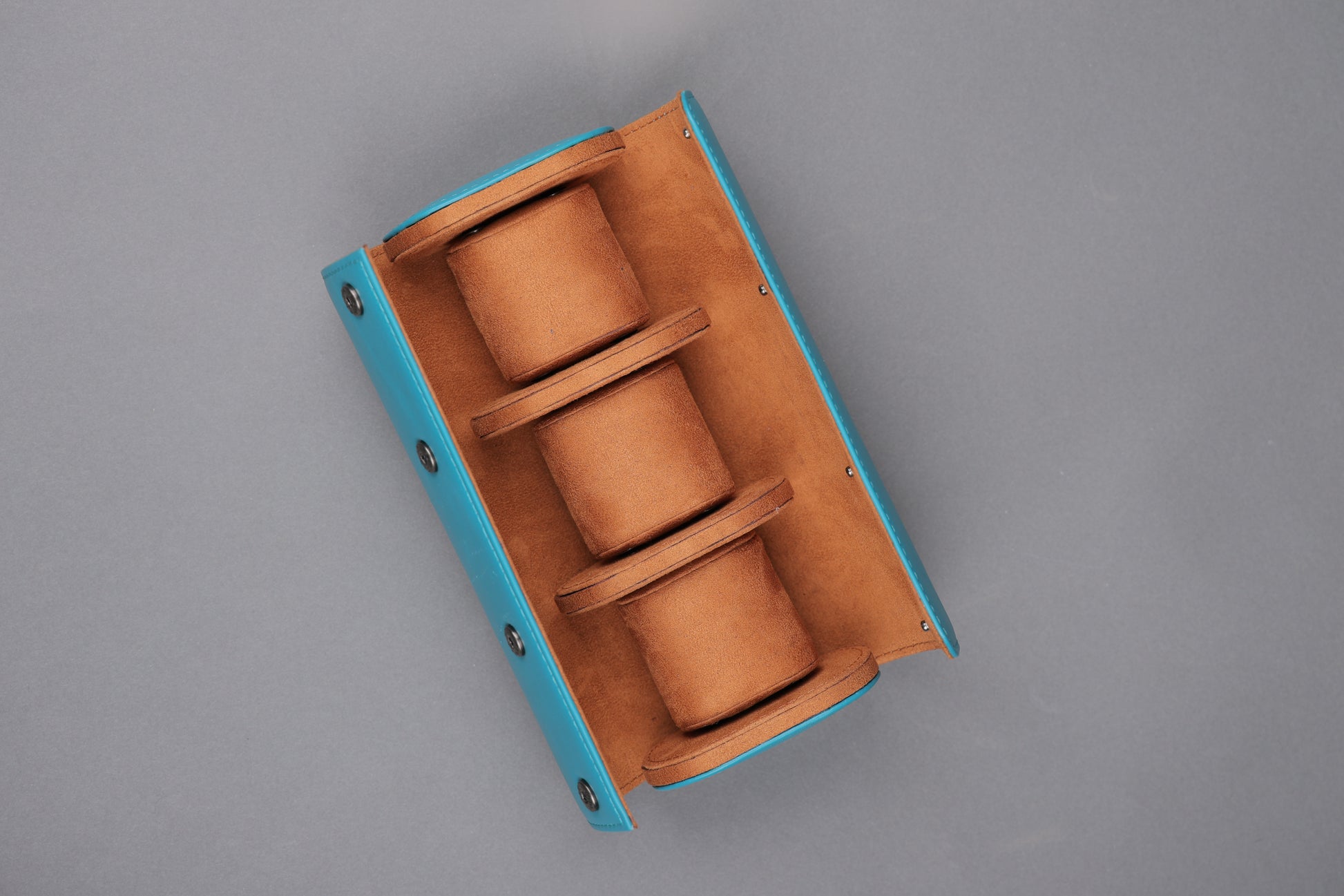 TURQ EXTERIOR AND TAN INTEROR WATCH ROLL- 3 SLOT