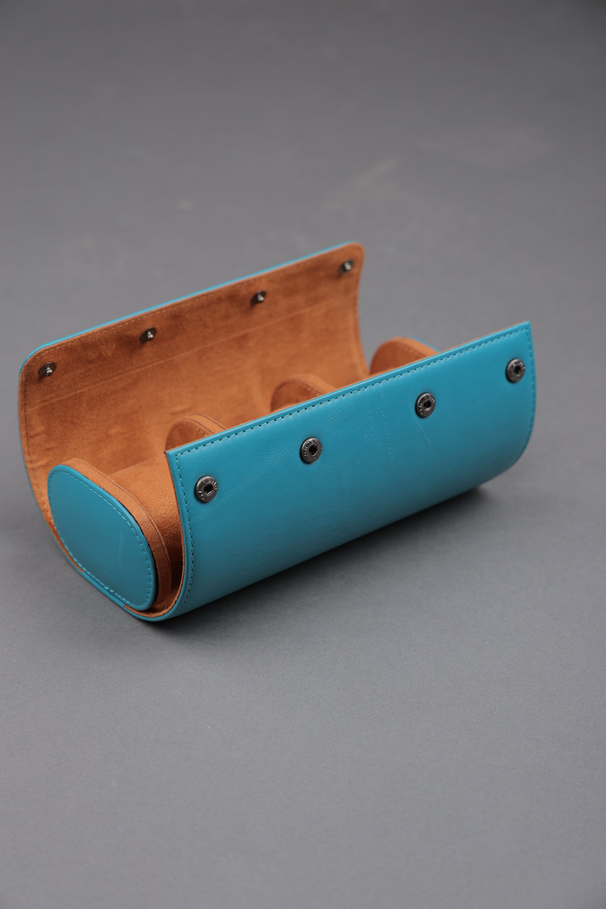 TURQ EXTERIOR AND TAN INTEROR WATCH ROLL- 3 SLOT